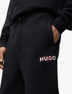 HUGO Relaxed-fit Tapered-leg Cotton-blend Jogging Bottoms 9 HUGO Relaxed-fit Tapered-leg Cotton-blend Jogging Bottoms -Outlet Daily Tops Store R04101020 BLACK ALT04